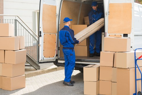 Removal team loading household items for a UK move