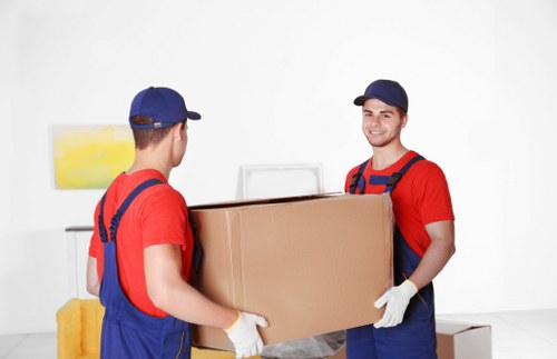 Removal team handling boxes during a Lambeth move
