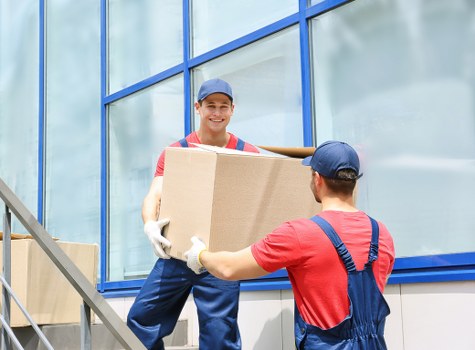 Removal team planning a home move in a Lambeth street