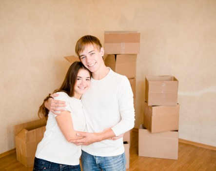Packed office equipment and furniture ready for relocation