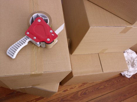 Packed boxes and moving supplies prepared for a house move